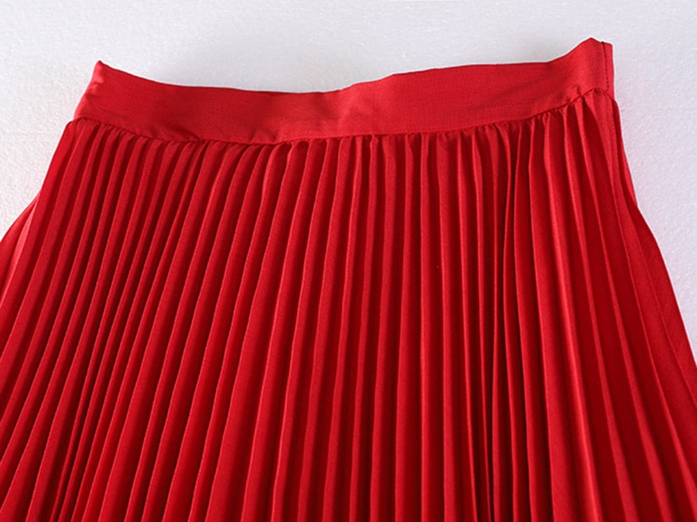 ASYMMETRICAL pleated skirt